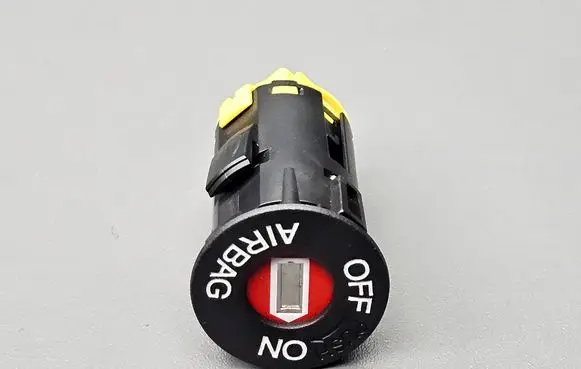 Passenger airbag on/off switch