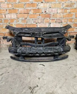 Radiator support slam panel