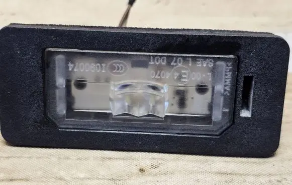 BMW 3 F30 F35 F31 Number plate light 7193293 142112153