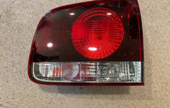 Volkswagen Touareg I Tailgate rear/tail lights 7L6945094T