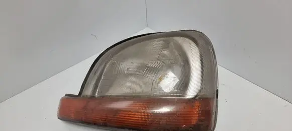 Renault Kangoo I Headlight/headlamp 7701044037