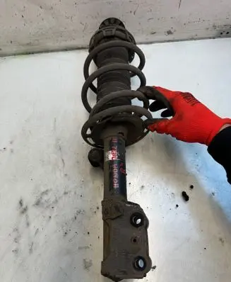 Honda Jazz Front shock absorber with coil spring 32423