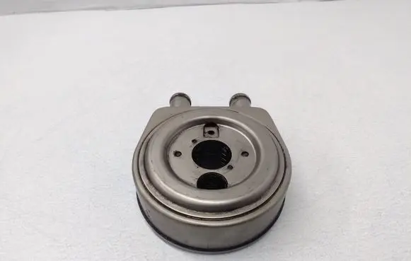KIA Carens I Oil filter mounting bracket