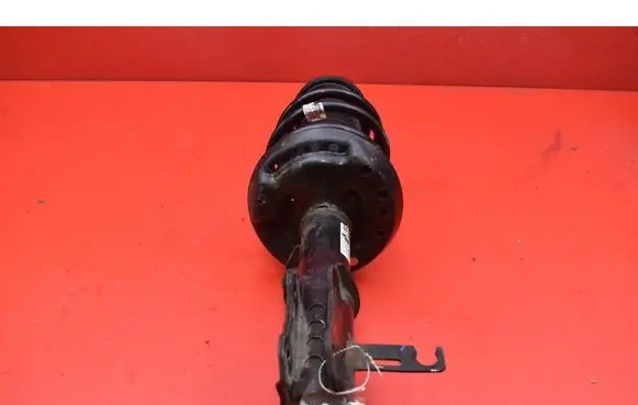 Opel Astra J Front shock absorber/damper 13412610