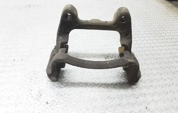 Volkswagen PASSAT B6 Brake caliper pad carrier rear 