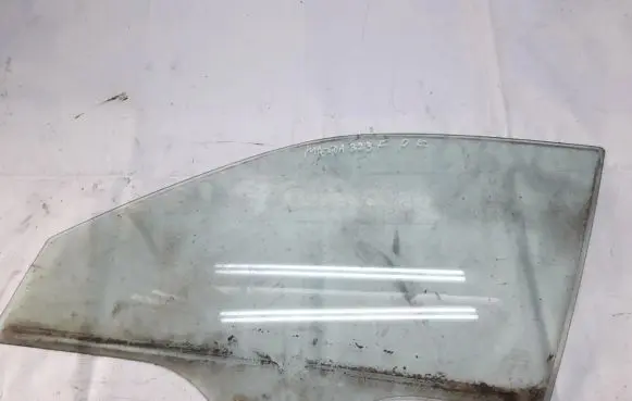 Mazda 323 F Front door window glass four-door