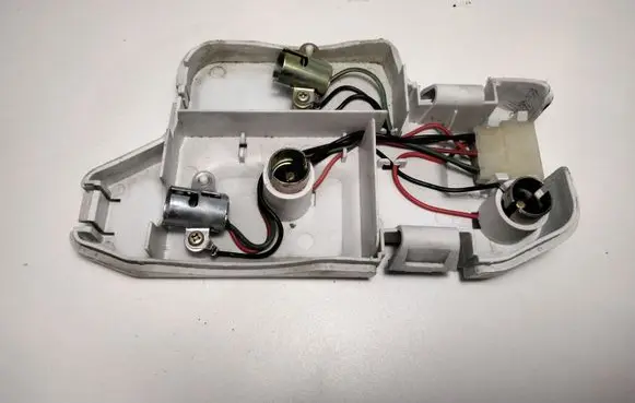 Mazda 626 Tail light bulb cover holder 0437860