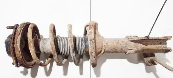 Mazda 323 F Front shock absorber/damper