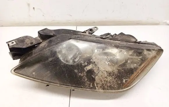 Mazda CX-7 Headlight/headlamp EH1051040 10041028