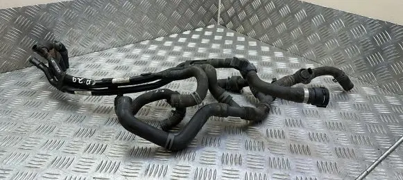 Volkswagen PASSAT B8 Engine coolant pipe/hose 5Q0121065F