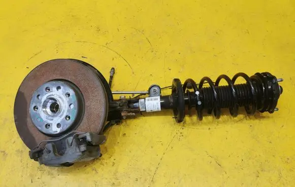 Front wheel hub spindle knuckle