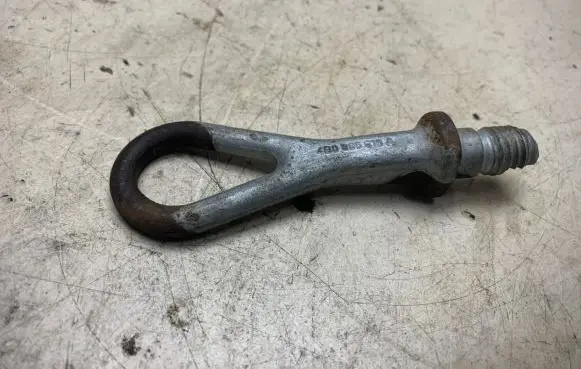 Towing hook eye