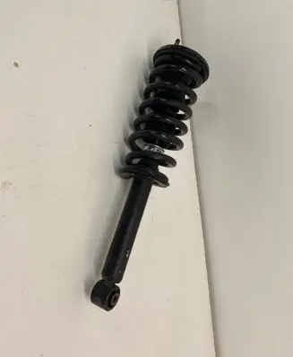 Mitsubishi Pajero Front shock absorber with coil spring MR554292