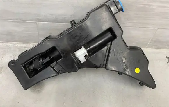 Audi A5 Lamp washer fluid tank 