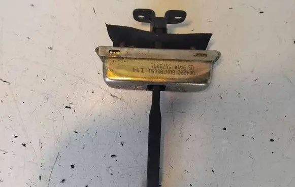 Front door check strap stopper