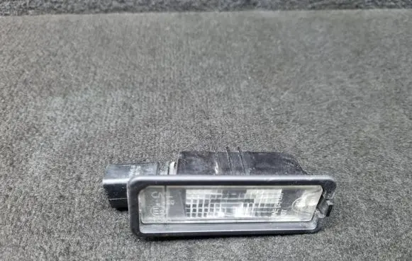 Volkswagen PASSAT B7 Number plate light 1K8943021