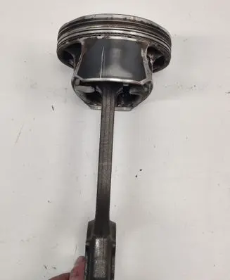 Piston with connecting rod