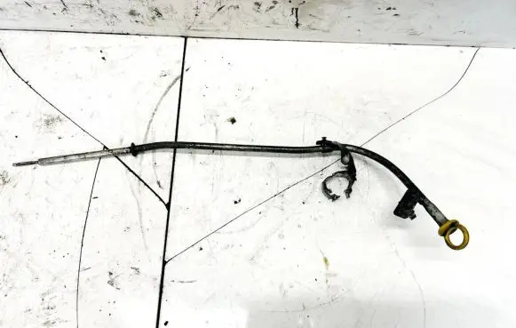 Oil level dip stick