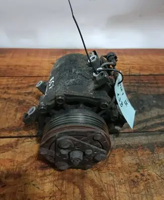 Suzuki Swift I Air conditioning (A/C) compressor (pump) 9520062JA0 AKC201A083A AKC200A083A