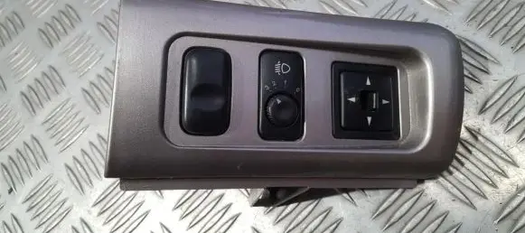 KIA Sedona Headlight level height control switch