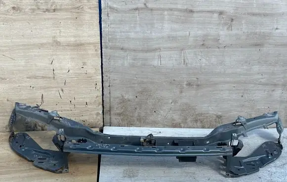 Top upper radiator support slam panel