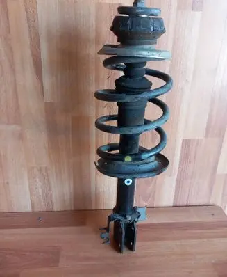 Dacia Logan II Front shock absorber with coil spring 543020322R 540103898R