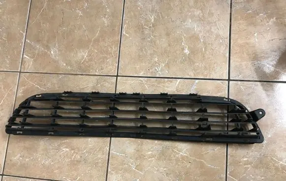 Opel Zafira B Front bumper lower grill 13124978