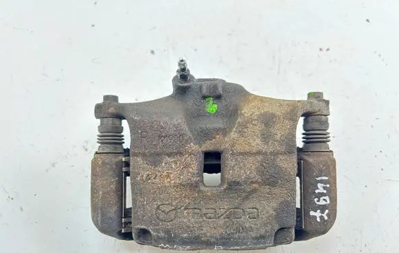 Mazda 3 II Front brake caliper K1900