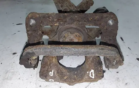 Opel Astra J Rear brake caliper