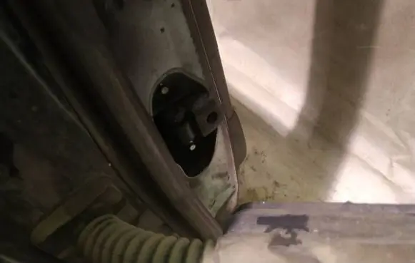 Rear door check strap stopper