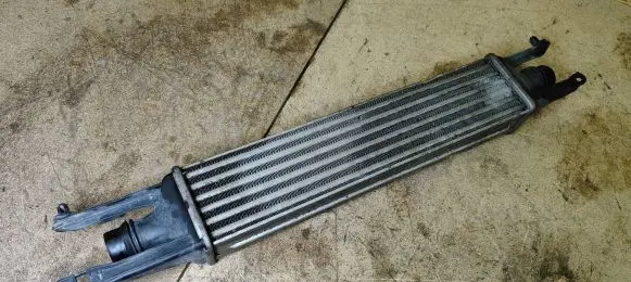 Opel Corsa D Intercooler radiator 55702004