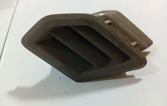 Dash center air vent grill
