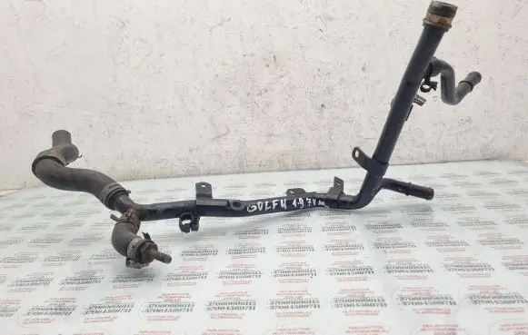 Volkswagen Golf IV Engine coolant pipe/hose 038121065B
