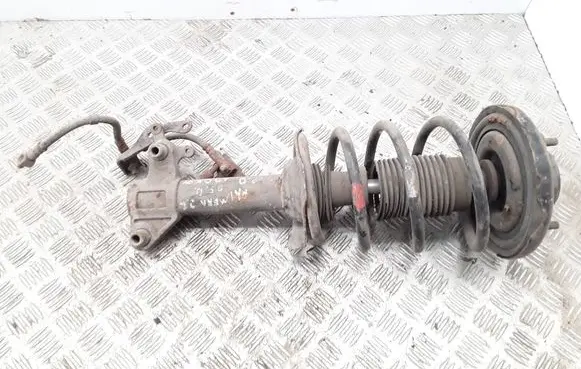 Nissan Primera Front shock absorber with coil spring