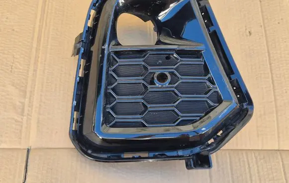 Suzuki Across Front fog light trim/grill 52127-42251