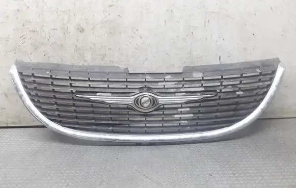 Chrysler Voyager Front bumper upper radiator grill 4857522AA