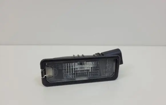 Volkswagen Golf VII Number plate light 1K8-943-021