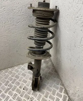 KIA Sportage Front shock absorber with coil spring 546503u000