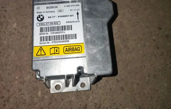 BMW 1 E81 E87 Airbag control unit/module 9166057 0285010066