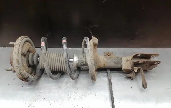 Mitsubishi Lancer X Front shock absorber with coil spring