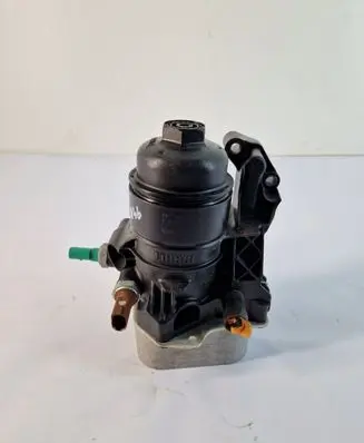 Volkswagen Jetta VI Oil filter mounting bracket 03N115389B