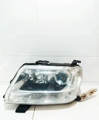 Suzuki Grand Vitara II Headlight/headlamp KOITO10059079 E3T15971
