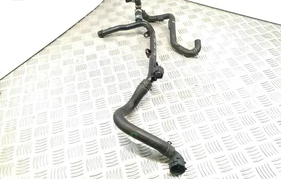 Skoda Superb B6 (3T) Engine coolant pipe/hose 03L121065AJ