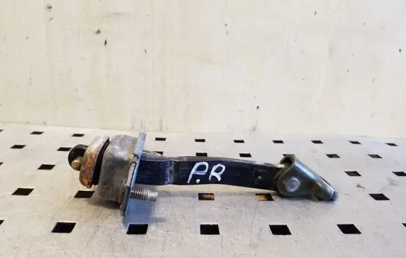 Front door check strap stopper
