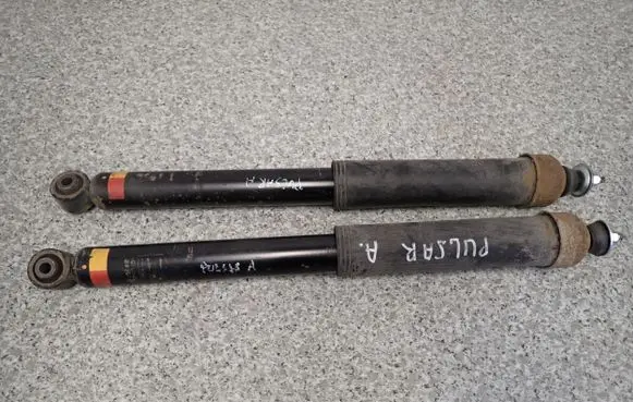 Nissan Pulsar Front shock absorber with coil spring