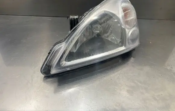 Suzuki Liana Headlight/headlamp 10032665