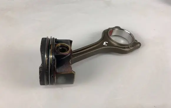 Volkswagen Golf VIII Piston with connecting rod 04EAM L1607095 1607095