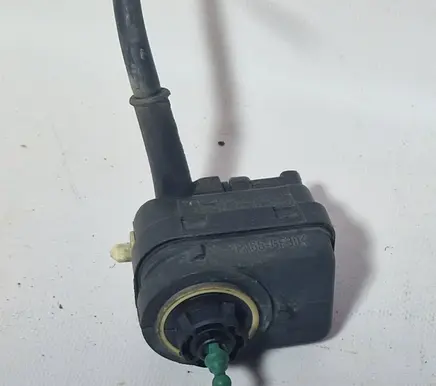 Renault Megane I Headlight level adjustment motor 7700840141