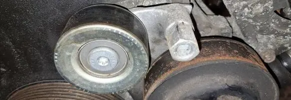 Generator/alternator belt tensioner