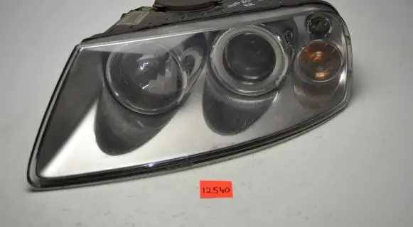 Volkswagen Touareg I Headlight/headlamp 7L6941015CG 89308471 3070905